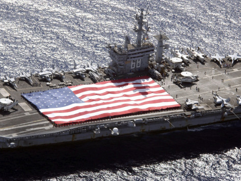 stocktrek-images-personnel-participate-in-a-flag-unfurling-rehearsal-on-the-flight-deck-aboard-uss-nimitz
